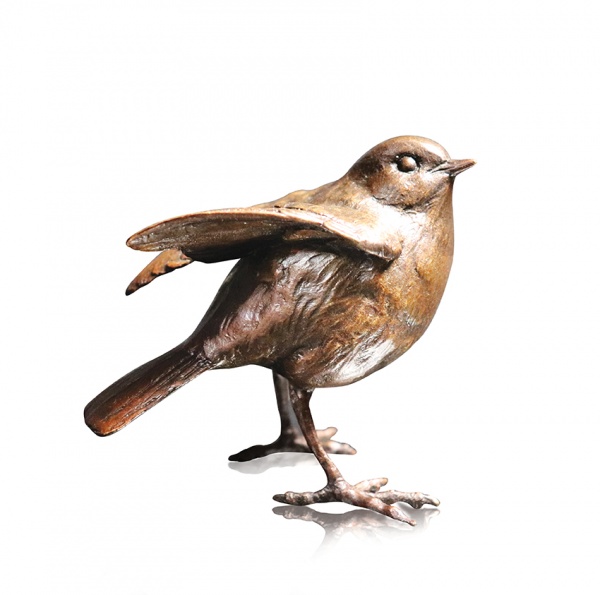 Bronze sculpture of a robin standing