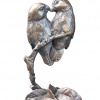 small bronze sculpture of two lovebirds