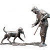 bronze sculpture of a dog retrieving a pheasant at a shoot
