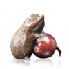 cute hedgehog bronze sculpture with an apple