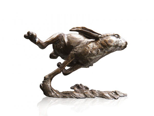 medium sized bronze sculpture of a hare running