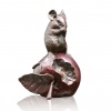 Bronze sculpture of a mouse on an apple