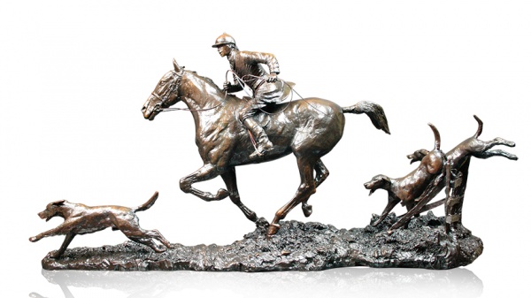 bronze sculpture showing a hunting scene with hounds and horse