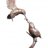 Bronze sculpture of two kingfishers feeding on a fish