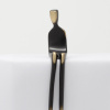 bronze sculpture of a boy in a black patina with polished features by artist yenny cocq