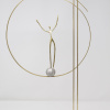 hand signed limited edition bronze sculpture by artist Anna Andreadi with a figure balancing in a circle