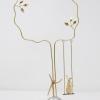 Limited Edition hand made bronze sculpture featuring a couple celebrating whilst sitting on top pf the world with the tree life above and her swinging by Anna Andreadi