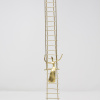 Limited Edition hand made bronze sculpture featuring a woman swinging after having climbed a large ladder by Anna Andreadi