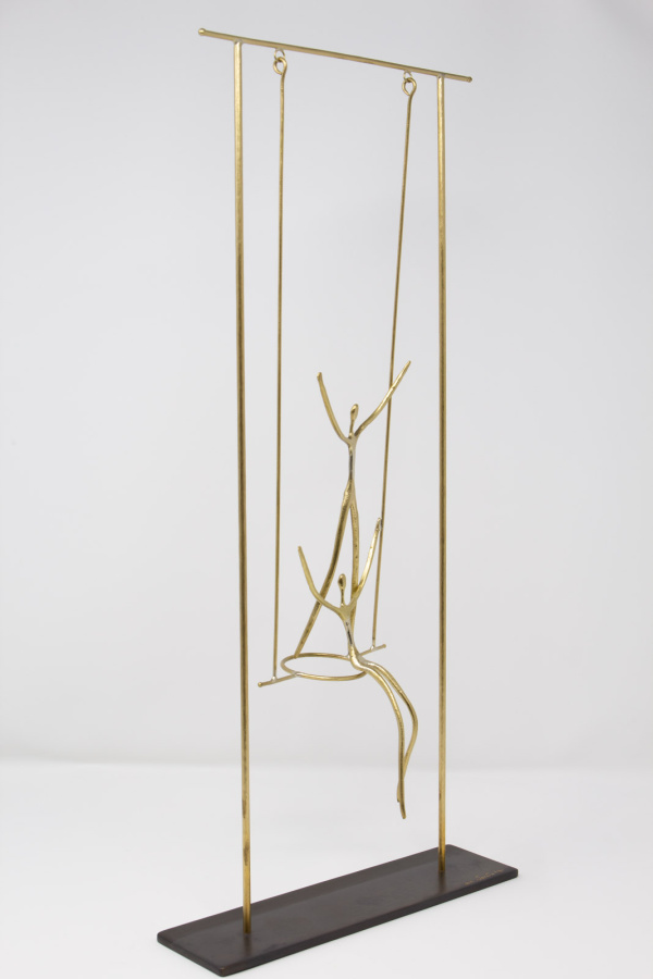 Limited Edition hand made bronze sculpture featuring a couple swinging together the swing actually moves by Anna Andreadi