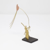 Limited Edition Bronze Sculpture featuring a couple in a romantic setting with a heart shaped kite by Anna Andreadi
