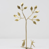 Limited Edition hand made bronze sculpture featuring a couple celebrating under a tree on top of a seesaw by Anna Andreadi