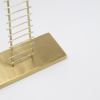 Limited Edition hand made bronze sculpture featuring a couple celebrating under a tree on top of a seesaw by Anna Andreadi
