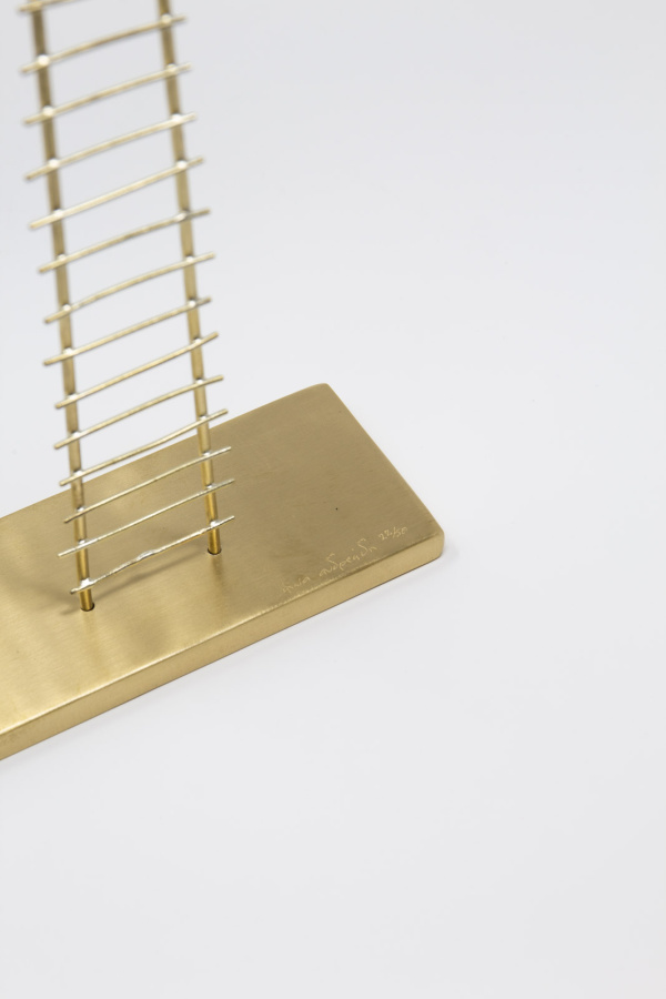 Limited Edition hand made bronze sculpture featuring a couple celebrating under a tree on top of a seesaw by Anna Andreadi
