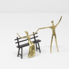 hand signed limited edition bronze sculpture by artist Anna Andreadi of two figures celebrating a proposal