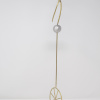 signed limited edition bronze sculpture by artist Anna Andreadi of a balancing figure upon a wheel and pole