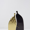 hand signed limited edition bronze sculpture by artist Anna Andreadi with two figures connected together in a curved shape