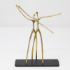 Limited Edition hand made bronze sculpture featuring a couple of individuals not sexed and celebrating with their hands up by Anna Andreadi