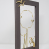 Limited Edition hand made bronze sculpture featuring a couple in the park her sitting on a bench with her arms up celebrating and a lovely dark frame framing the scene with a couple of birds flying over by Anna Andreadi