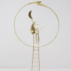 Limited Edition hand made bronze sculpture featuring a couple holding a moon whilst climbing a ladder, the scene is framed by a lovely bronze circle by Anna Andreadi