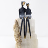 romantic bronze couple on stone base by Yenny Cocq