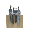 bronze sculpture of four figures in grey patina by Yenny Cocq