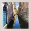 painting of canal in Venice with blue door