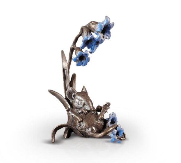bronze sculpture of a mouse with bluebell flowers