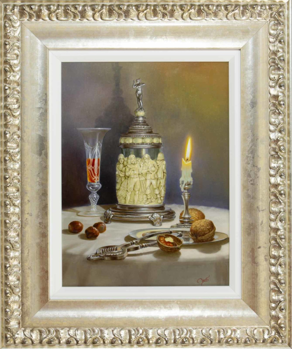Original still life oil painting featuring a porcelain and silver vase, a champagne flute and a candle lit next to a couple of open nuts and a nutcracker by talented Gyula Boros