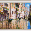 large oil painting of a Venice canal with gondolas, blue sky and intricate water reflections by artist Raffaele Fiore