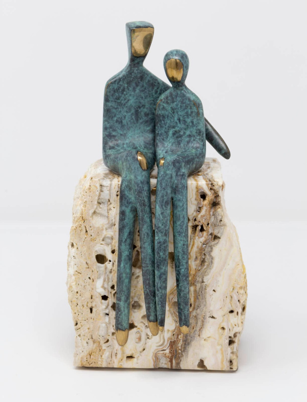 limited edition bronze sculpture of two statuettes finished in a verdigris patine in a minimalist style embracing one another in a romantic pose sat atop a solid stone base