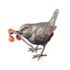 wren with berries bronze sculpture by keith sherwin